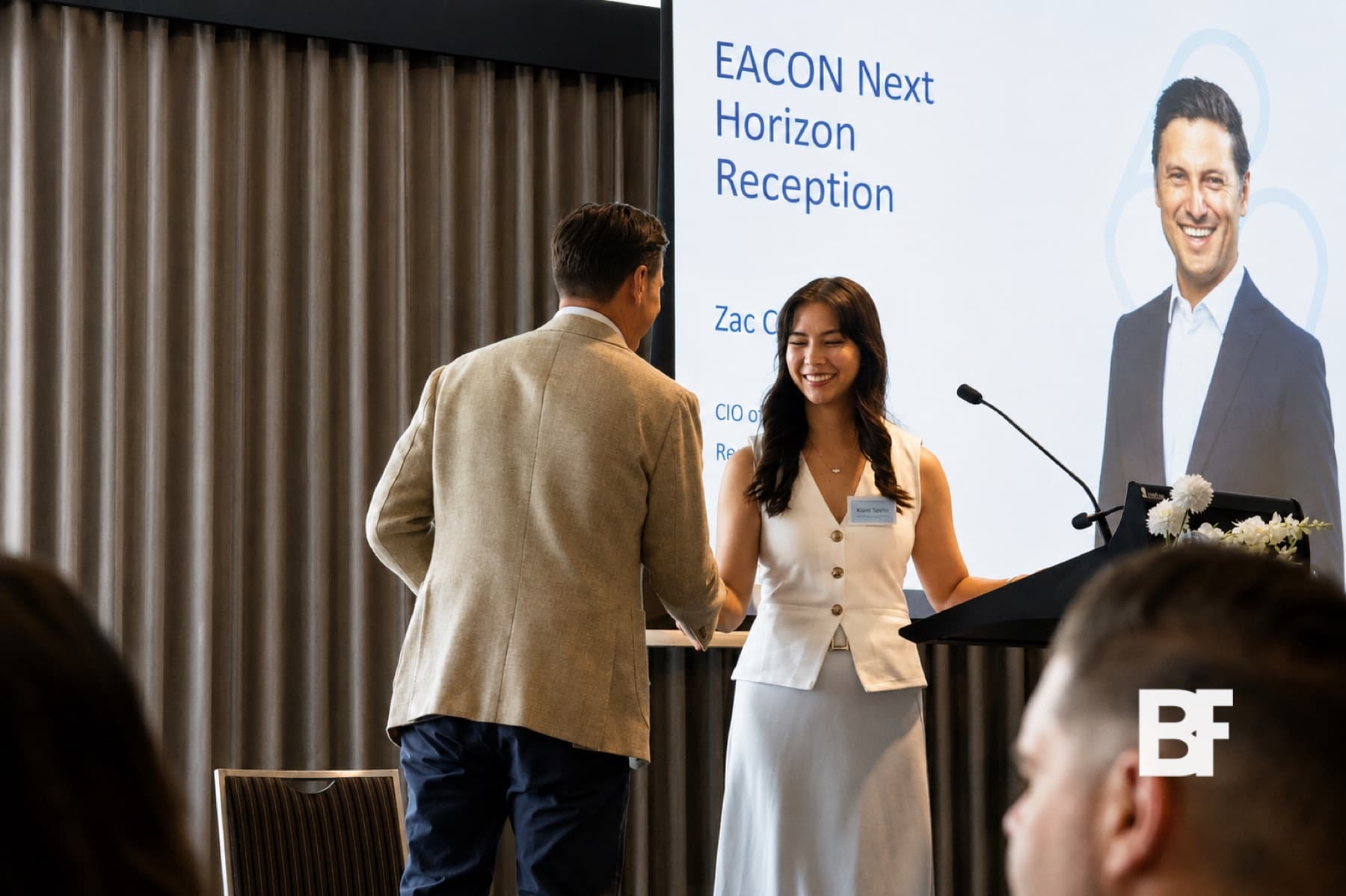 Award presentation at a corporate reception photographed by BASEFORM